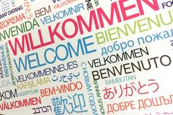 Schmuckbild mit dem Begriff "Willkommen" in verschiedenen Sprachen